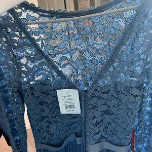 David’s Bridal dress. Bought for a wedding but went another route.